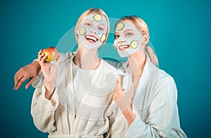 Girls friends sisters making clay facial mask. Anti age mask. Stay beautiful. Skin care for all ages. Women having fun