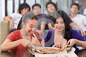 Girls got the first chance to eat pizza