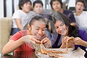 Girls got the first chance to eat pizza
