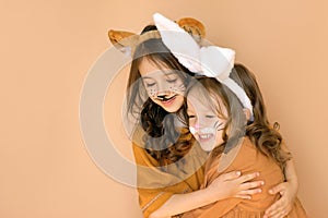 Girls in the guise of a rabbit and a tiger are symbols of the outgoing old year 2022 and the new year 2022.