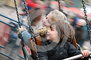 Girls having fun on the Carousel