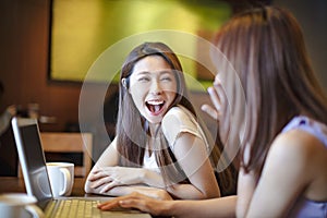 girls having fun in coffee shop