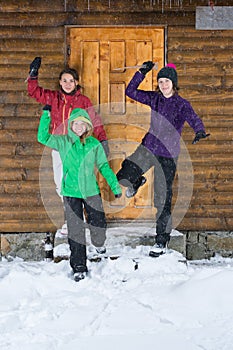 Girls having fun at a lodge in winter