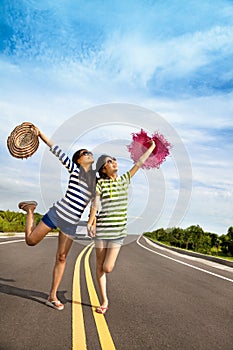 Girls having fun on the road trip