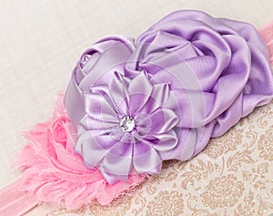 Girls Headband. Pink shabby flower with rosettes and a diamonte. photo