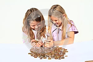 Girls holding money in hands