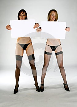 Girls holding white signs