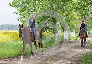 Girls on horseback riding