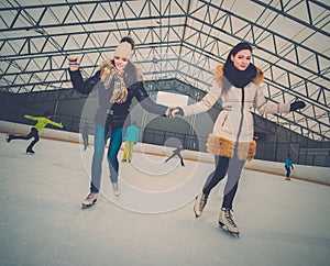 Girls on ice-skating rink