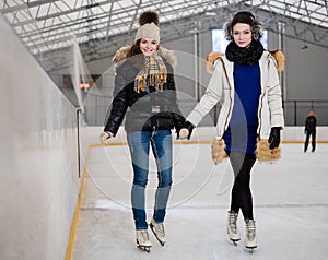 Girls on ice-skating rink