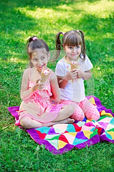 Girls kids sisters friends teasing eating ice cream