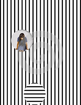 A girls leans out of an opening created in a wall of stripes.