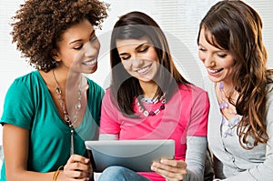 Girls Looking At Digital Tablet