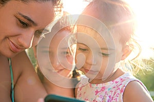 Girls looking at a phone