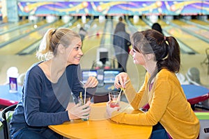 Girls meeting at bowling center