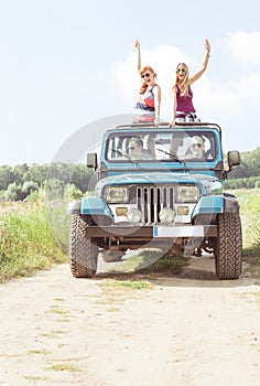 Girls in off-road vehicle