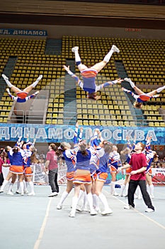 Girls - participants of cheerleaders team Leader perform