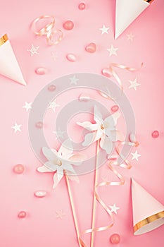 Girls party accessories over the pink background