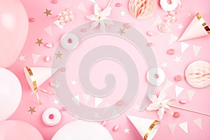 Girls party accessories over the pink background. Invitation, bi