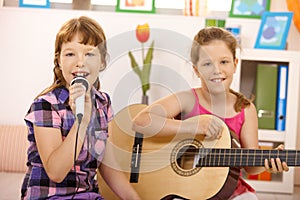 Girls performing music