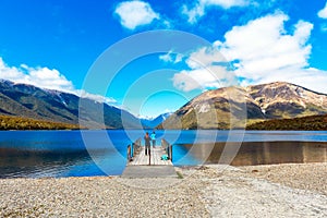 Girls on pier river Rotoiti, Nelson Lakes National Park, New Zealand