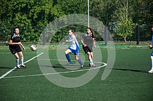 The girls play soccer