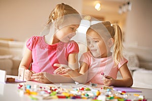 Girls playing at home. Happy little girls.