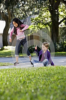 Girls playing hopscotch