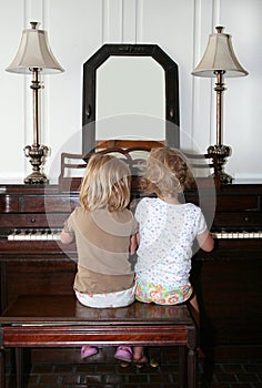 Girls Playing Piano photo