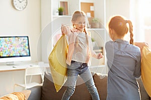 Girls Playing Pillow Fight