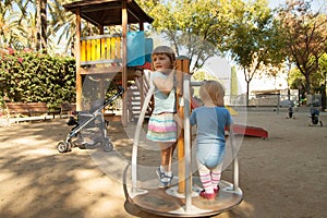 Girls playing in playground area