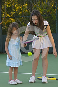 Girls Playing Tennis