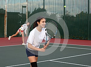Girls playing tennis img
