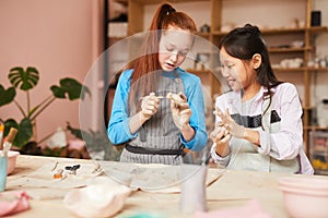 Girls in Pottery Workshop