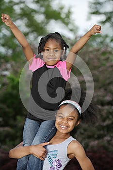 Girls Practice Cheerleading Stunts