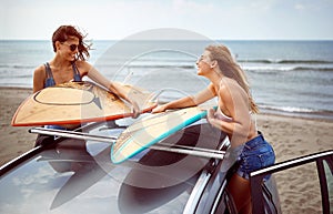 Girls ready to surf at the beach