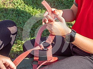 Girls from riding club set horse halter together