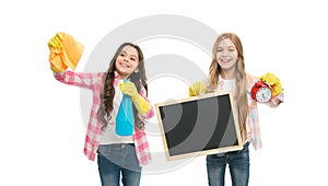 Girls with rubber protective gloves ready for cleaning. Informal education. Girls kids cleaning according to duty