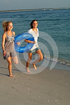 Girls running with float