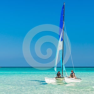 Girls sailing on a catamaran at Varadero beach in Cuba