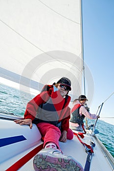 Girls sailing on yacht