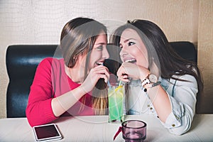 Girls share fruit cocktail