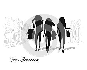 Girls with shopping bags in the city