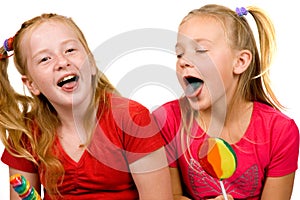 Girls are showing their blue tongue