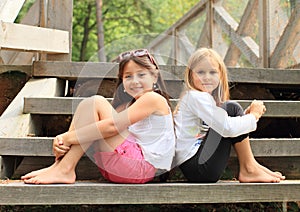 Girls sitting on stairs