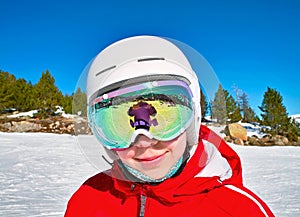 Girls in the ski helmet and goggles