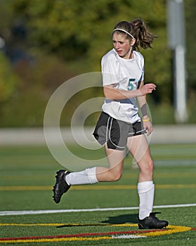 Girls soccer player on the field