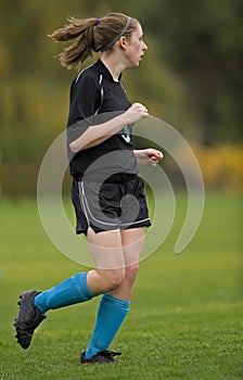 Girls soccer player on the field