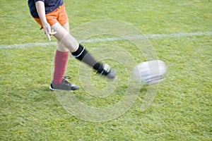 Girls Soccer Player Passing the Ball