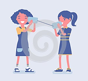 Girls speaking by tin can telephone